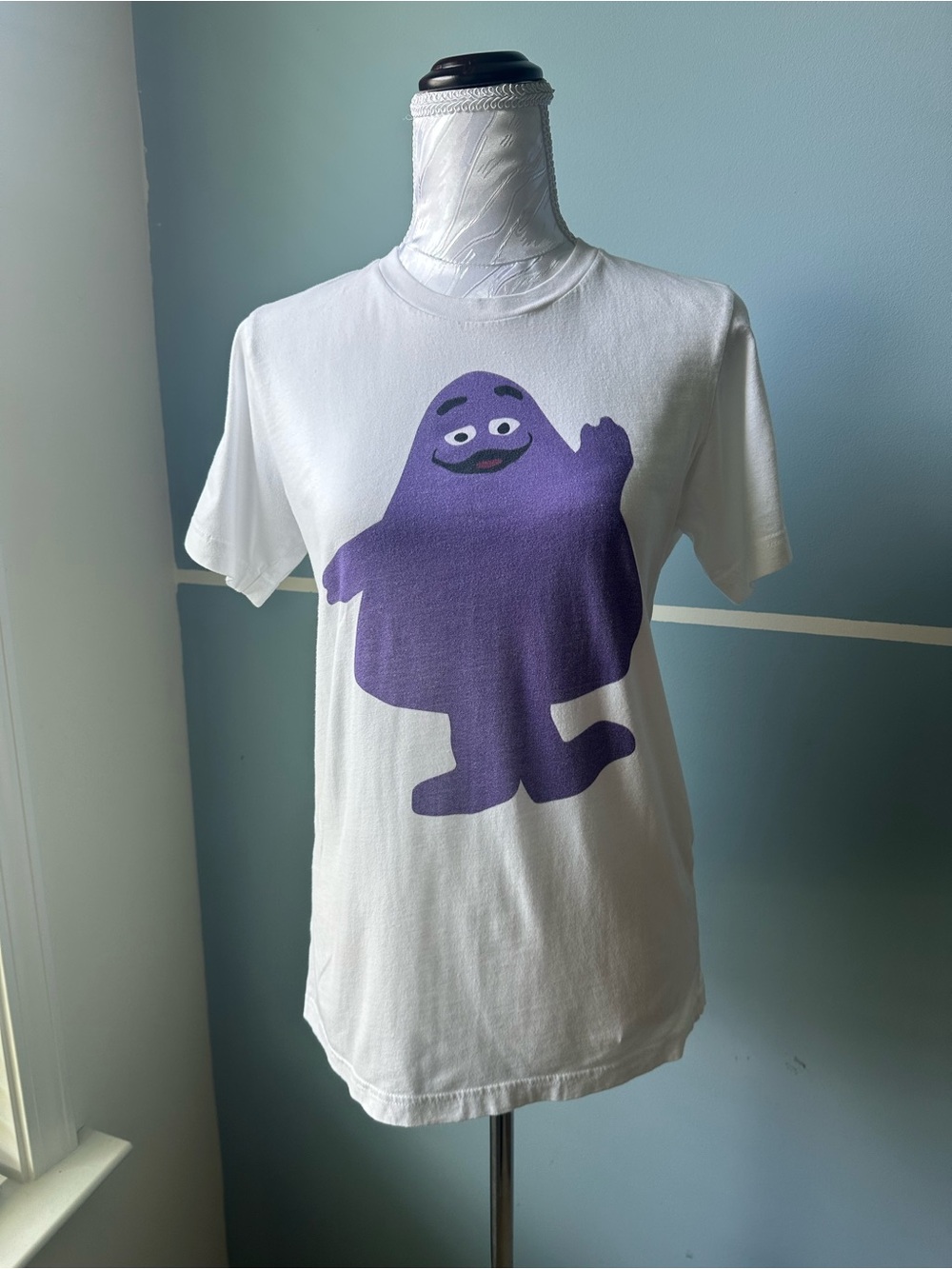 White T-Shirt with Purple Character Graphic
